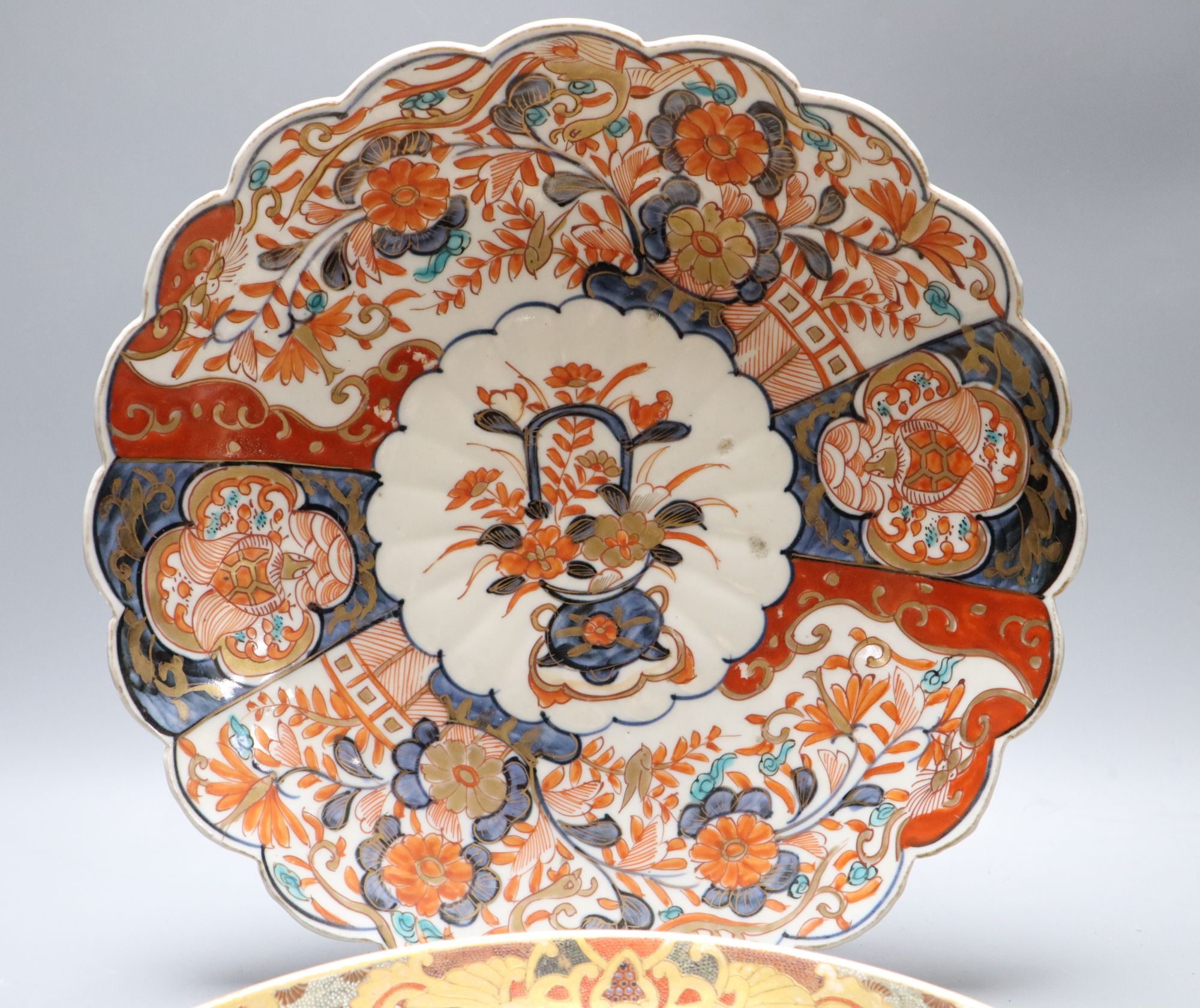 A quantity of mixed Japanese ceramics including a bowl, a dish and two pairs of vases